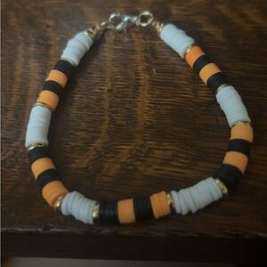 Black, White, and Orange Beaded Bracelet